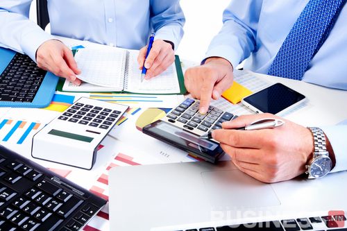 Hand with calculator. Finance and accounting business.